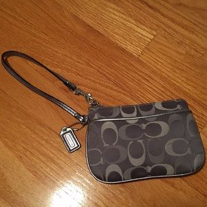 Small grey Coach wristlet